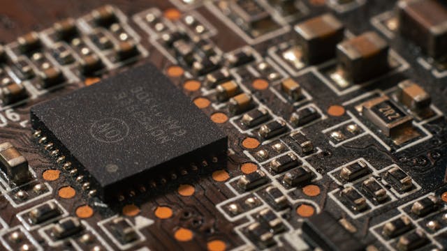 Broadcom Inc. (AVGO) Challenges EU Regulators While Barclays Sees AI Upside