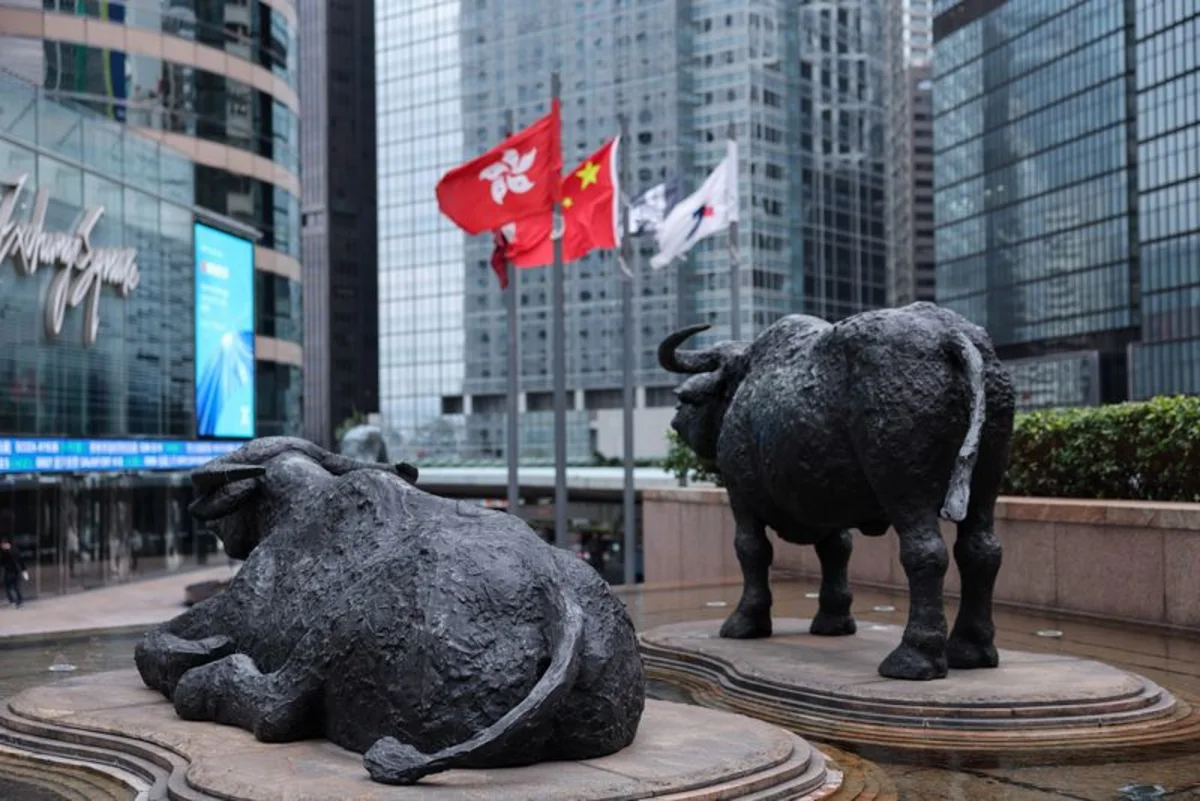 Wall Street surges, oil flat as chip stock rally continues