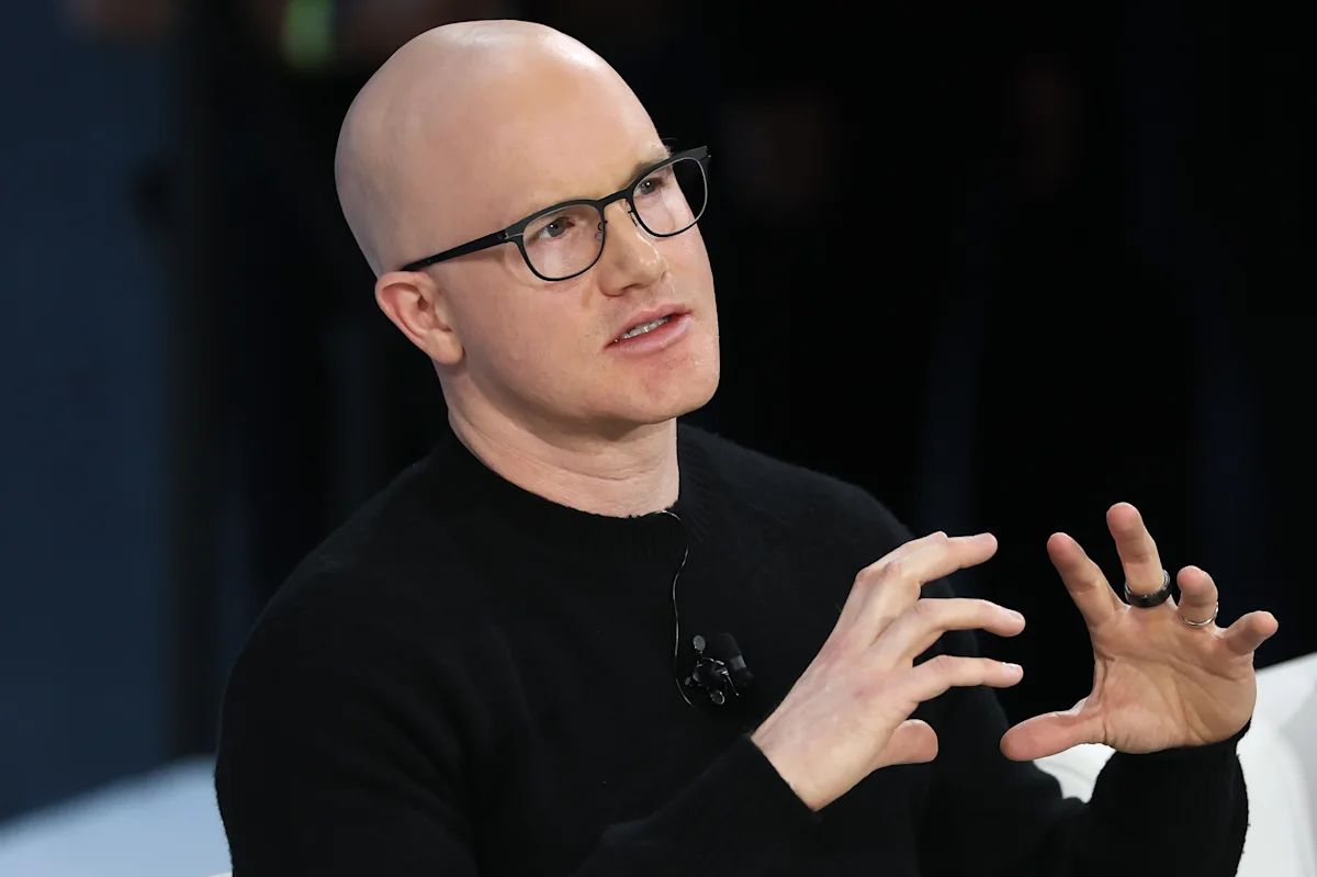 Coinbase CEO on bitcoin bottom, AI agents, and his war of words with JPMorgan CEO