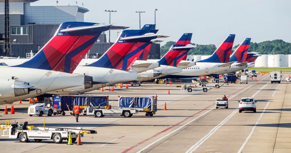 Delta passengers evacuated by slide after emergency landing in Atlanta - NBC News