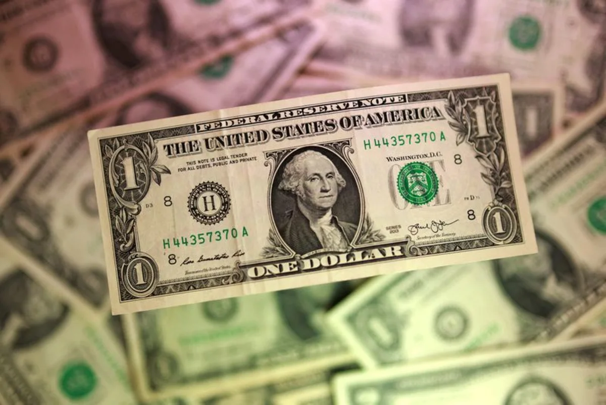 Dollar drops as weak US jobs data pushes out Fed hike expectations