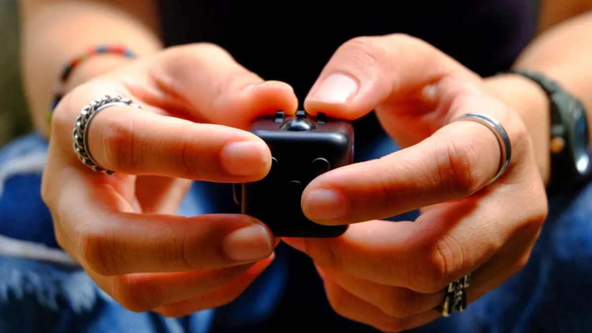 A burned-out teacher, 32, teamed up with her dad to sell fidget toys — now they're pulling in $428,000 a year