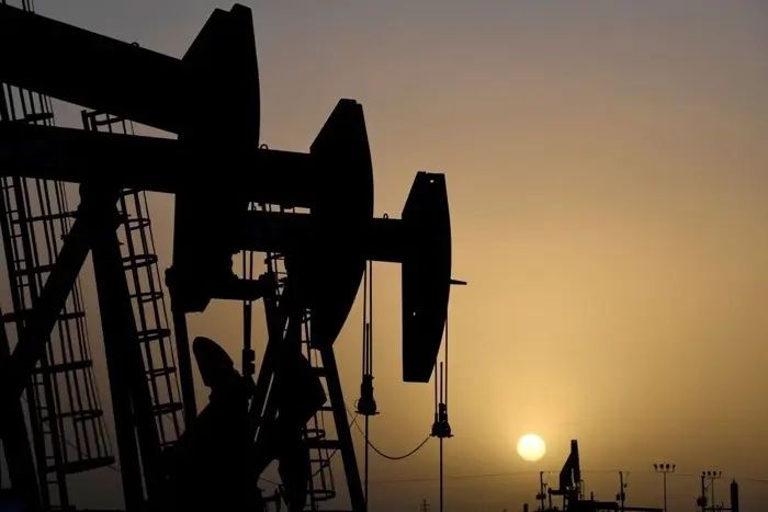 Oil slides on Iran supply prospects as traders wait on Warsh