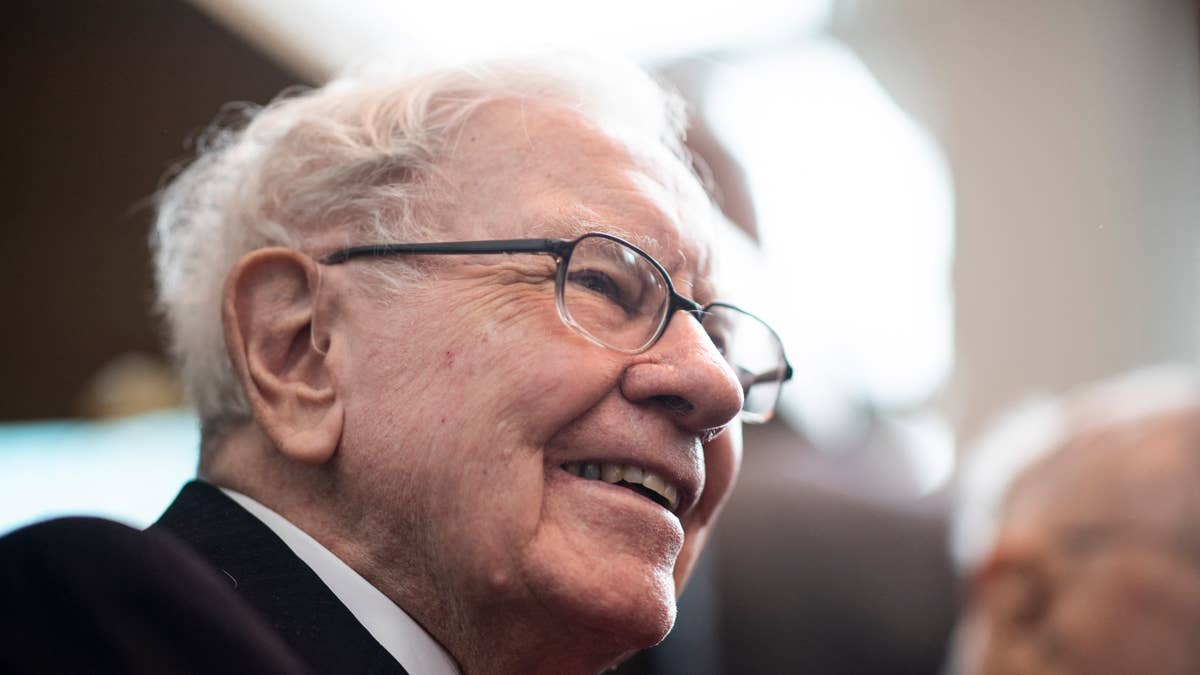Warren Buffett's Berkshire triples stake in newspaper giant