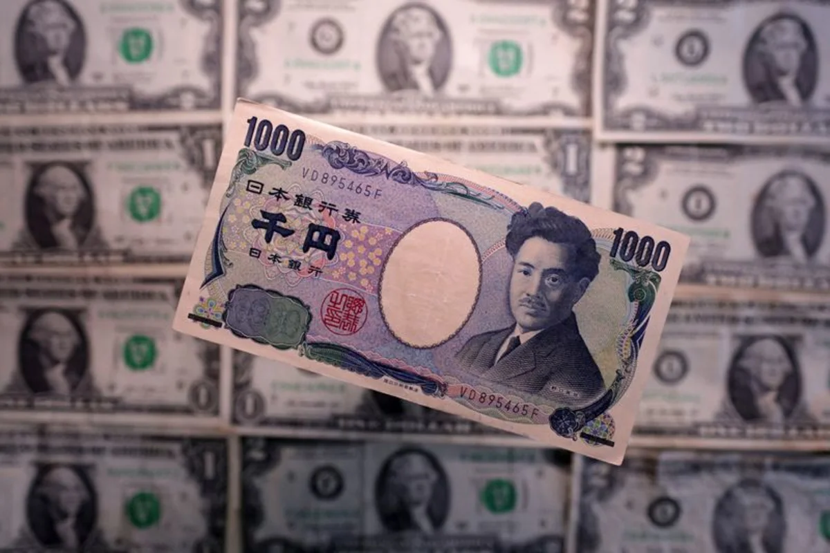 Dollar hits one-year high on Fed hike bets; Japan warns on yen