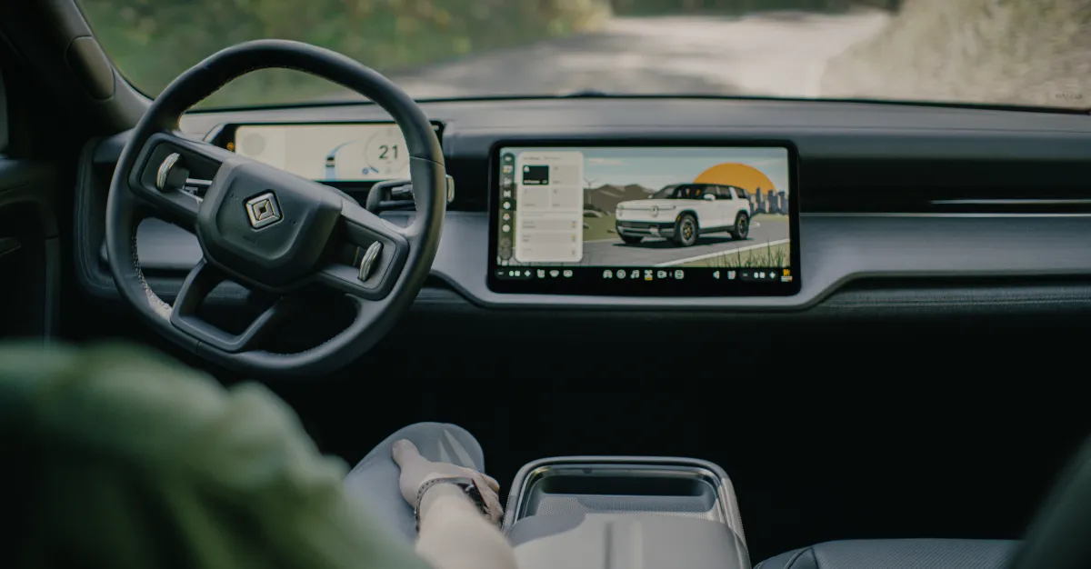 Uber to invest $1.25 billion in Rivian as part of new robotaxi deal - The Verge