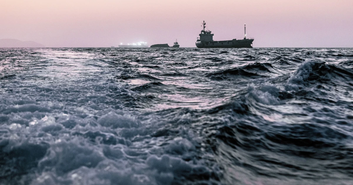 Oil tankers pass through the Strait of Hormuz despite Iran threats as traffic slowly picks up and oil prices fall