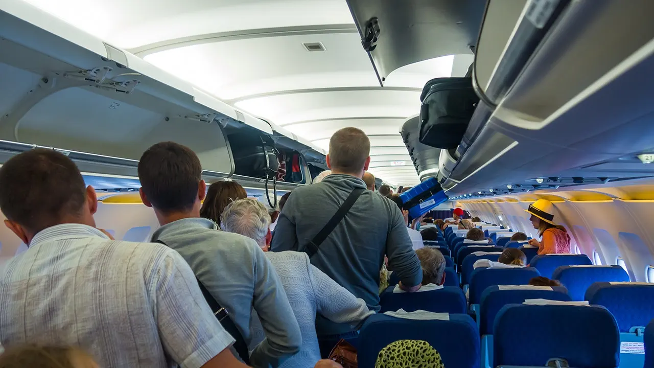 Major airline roasts passengers who jump up right after landing, igniting fierce backlash - Fox News
